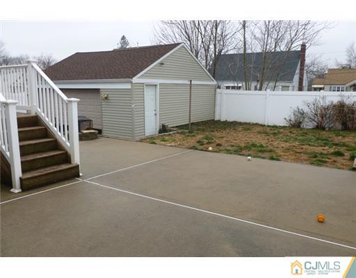 161 East Hill Road Colonia, NJ 07067 - Photo 15 of 16 a view of a house with a backyard