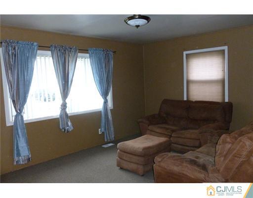 161 East Hill Road Colonia, NJ 07067 - Photo 3 of 16 a living room with furniture