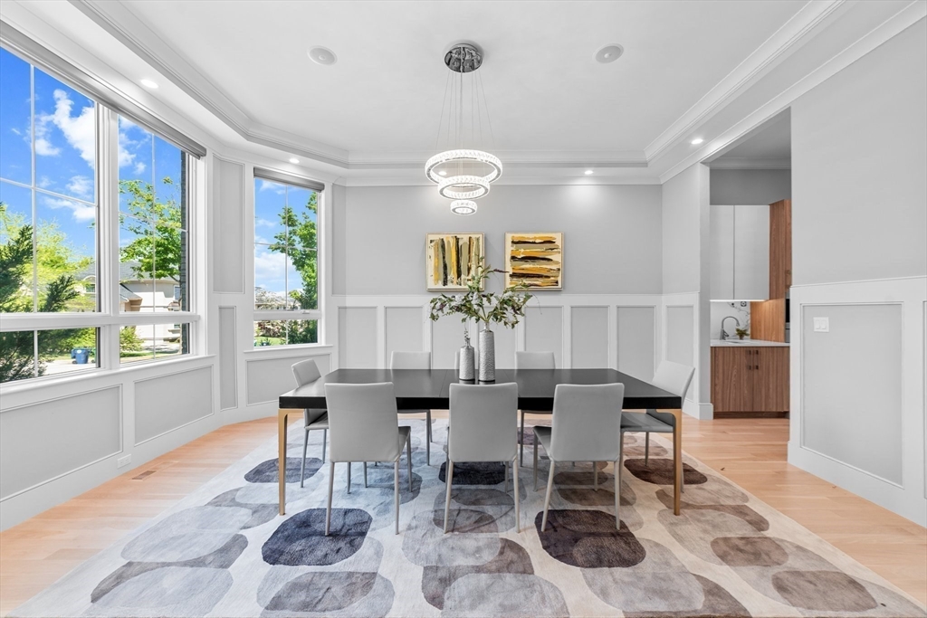 19 Boulder Road Newton, MA 02459 - Photo 12 of 42 a view of a dining room with furniture and wooden floor