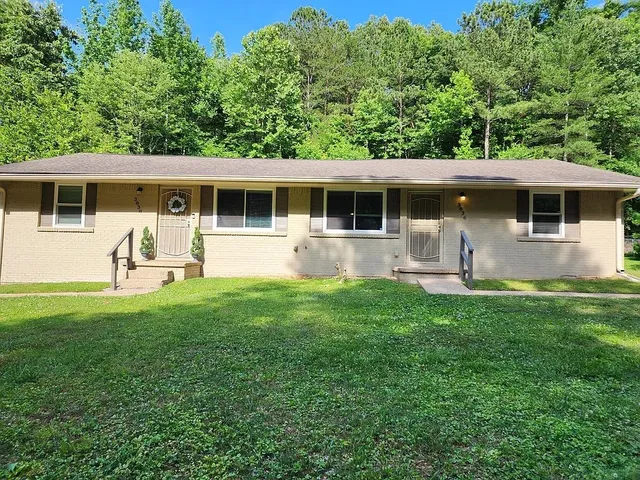 a house view with a garden space