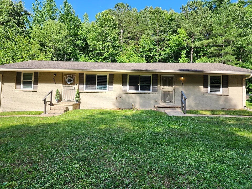 3836 Youngstown Road Chattanooga, TN 37406 - Photo 1 of 7 a house view with a garden space