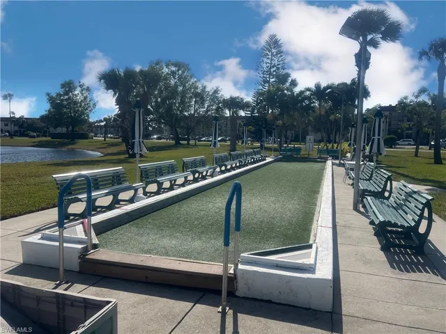 a view of sitting area with swimming pool and sitting area