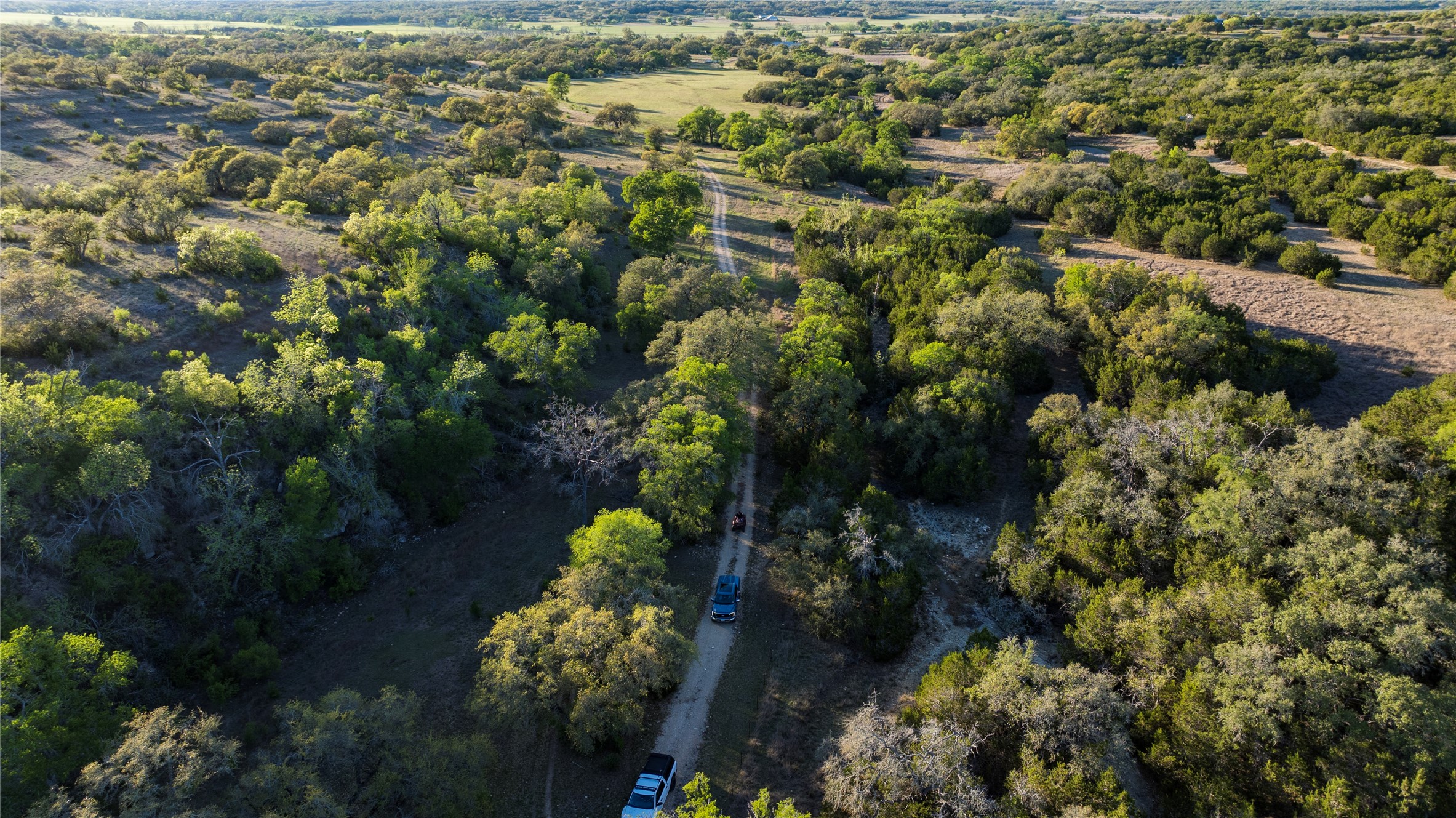 157 Chick Ranch Road Blanco, TX 78606 - Photo 11 of 34 an aerial view of a houses with a yard