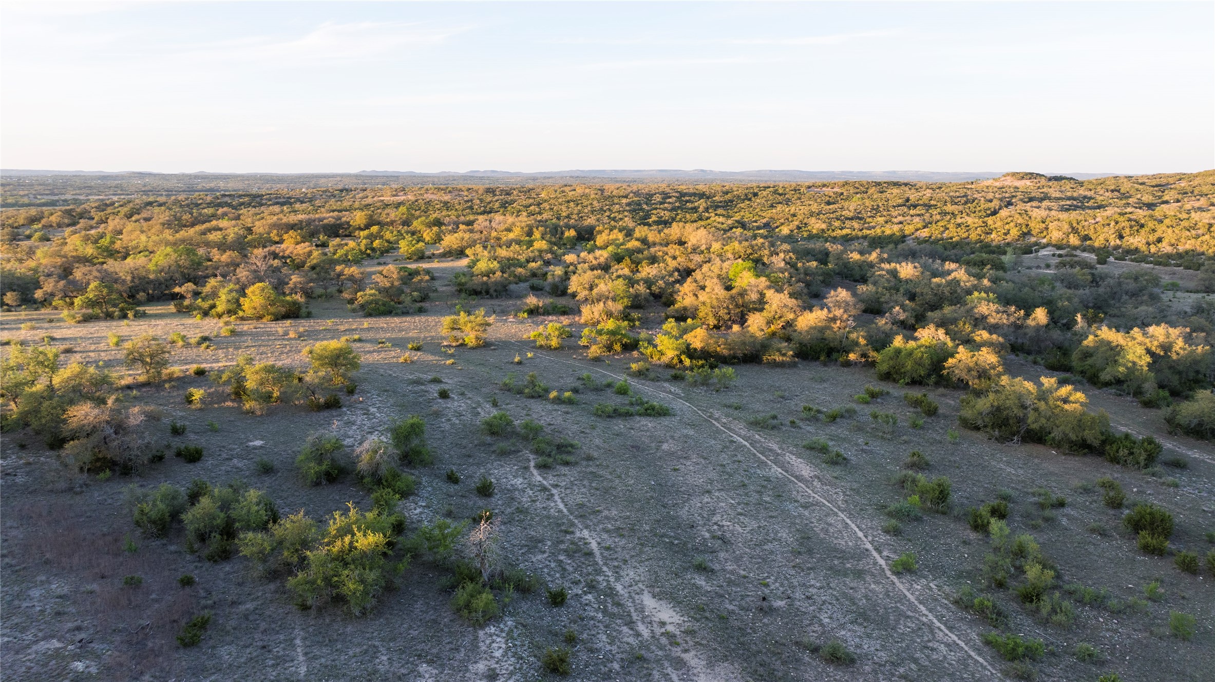 157 Chick Ranch Road Blanco, TX 78606 - Photo 25 of 34 an aerial view of multiple house