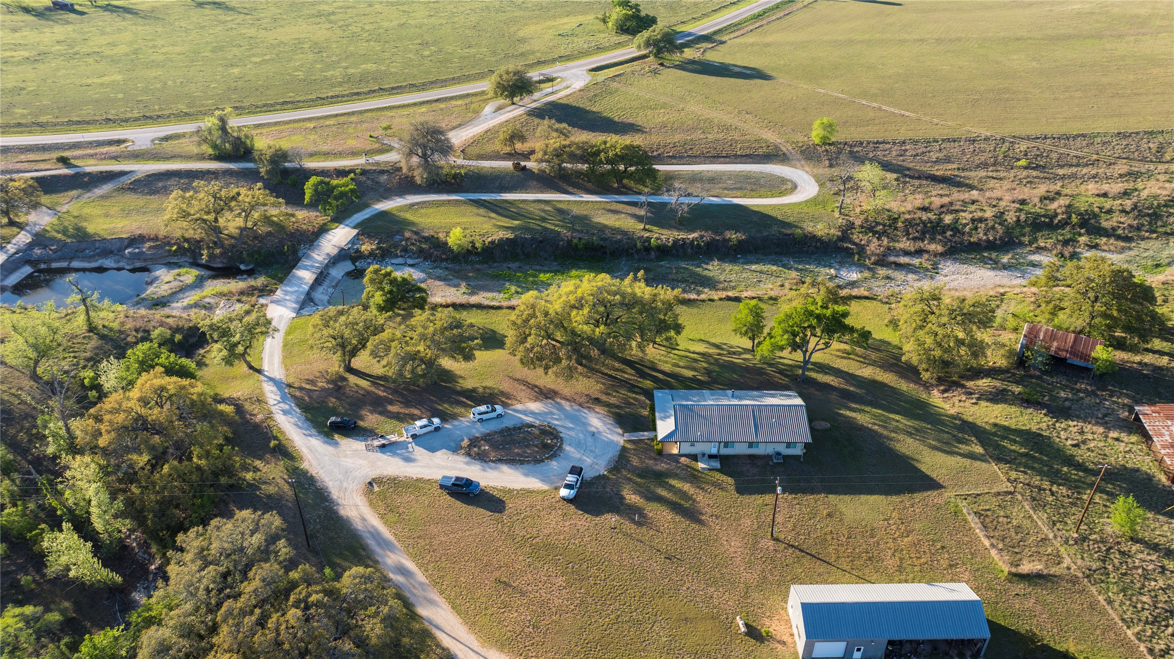 157 Chick Ranch Road Blanco, TX 78606 - Photo 6 of 34 a aerial view of residential houses with outdoor space