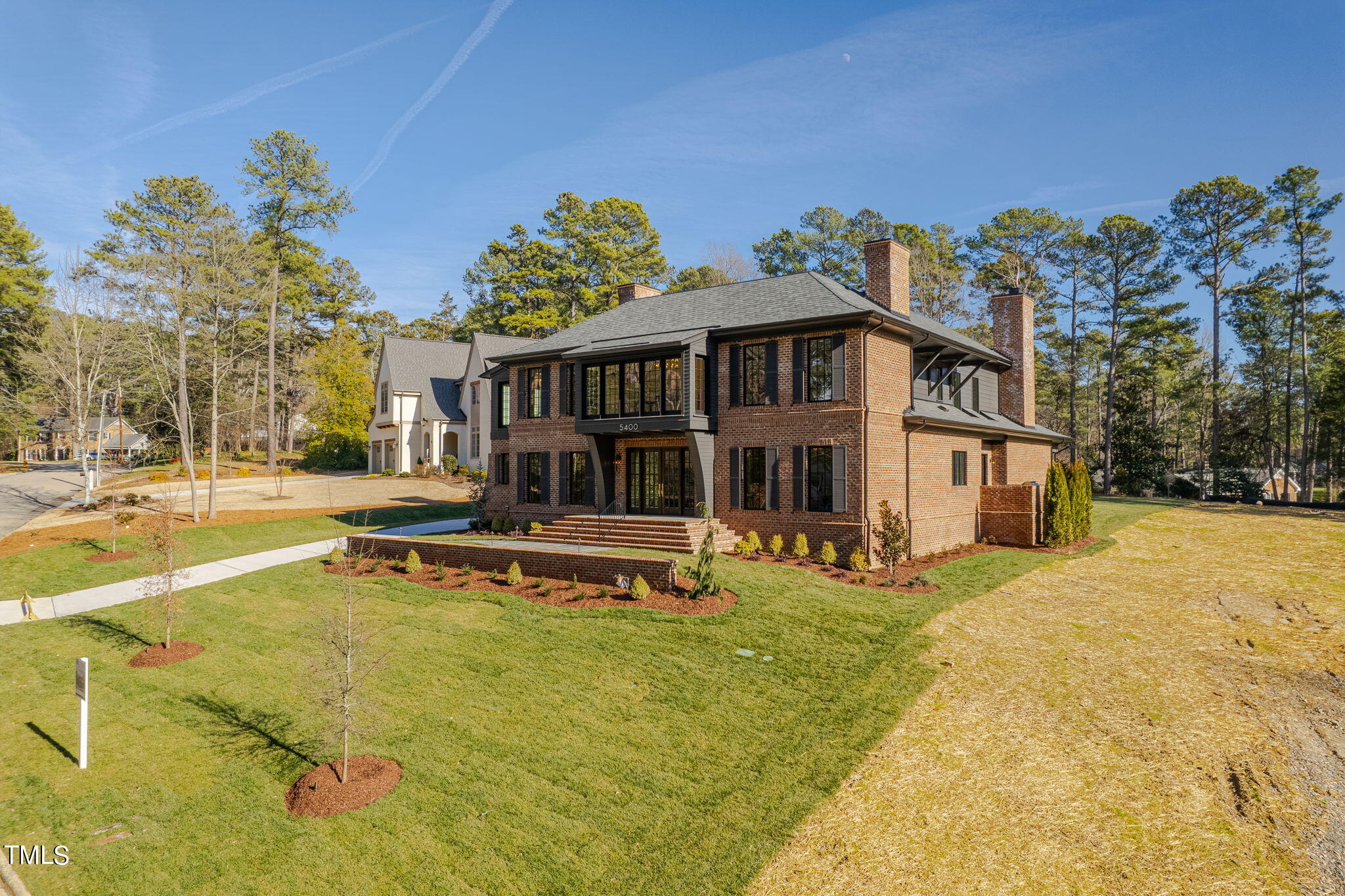 5400 Alpine Drive Raleigh, NC 27609 - Photo 3 of 70 a view of a house with pool and sitting area