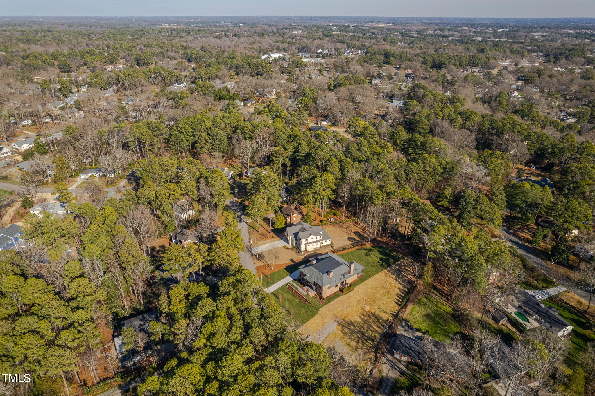 5400 Alpine Drive Raleigh, NC 27609 - Photo 64 of 70 an aerial view of residential houses with outdoor space and trees