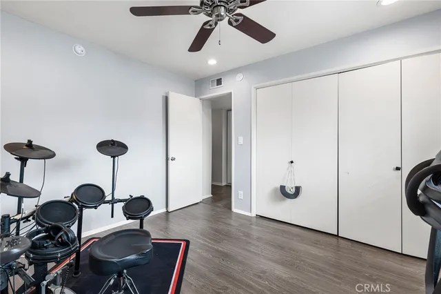 a view of a workspace with furniture and a chandelier