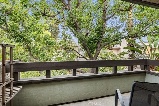 a view of swimming pool with outdoor seating