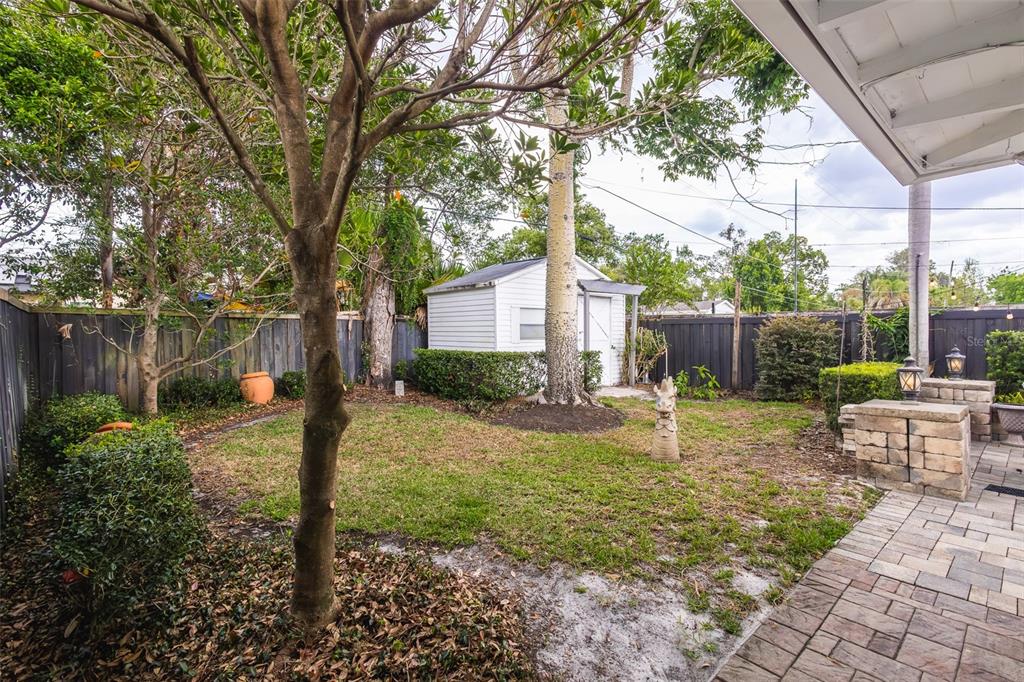 1001 Nottingham Street Orlando, FL 32803 - Photo 37 of 49 a backyard of a house with table and chairs
