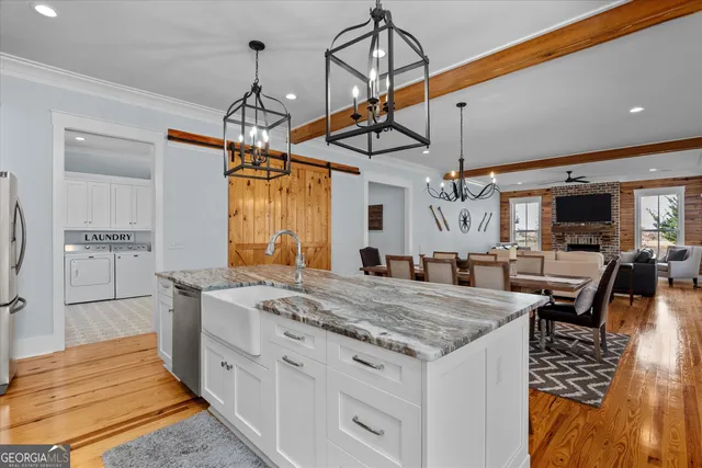 a bathroom with a glass shower door
