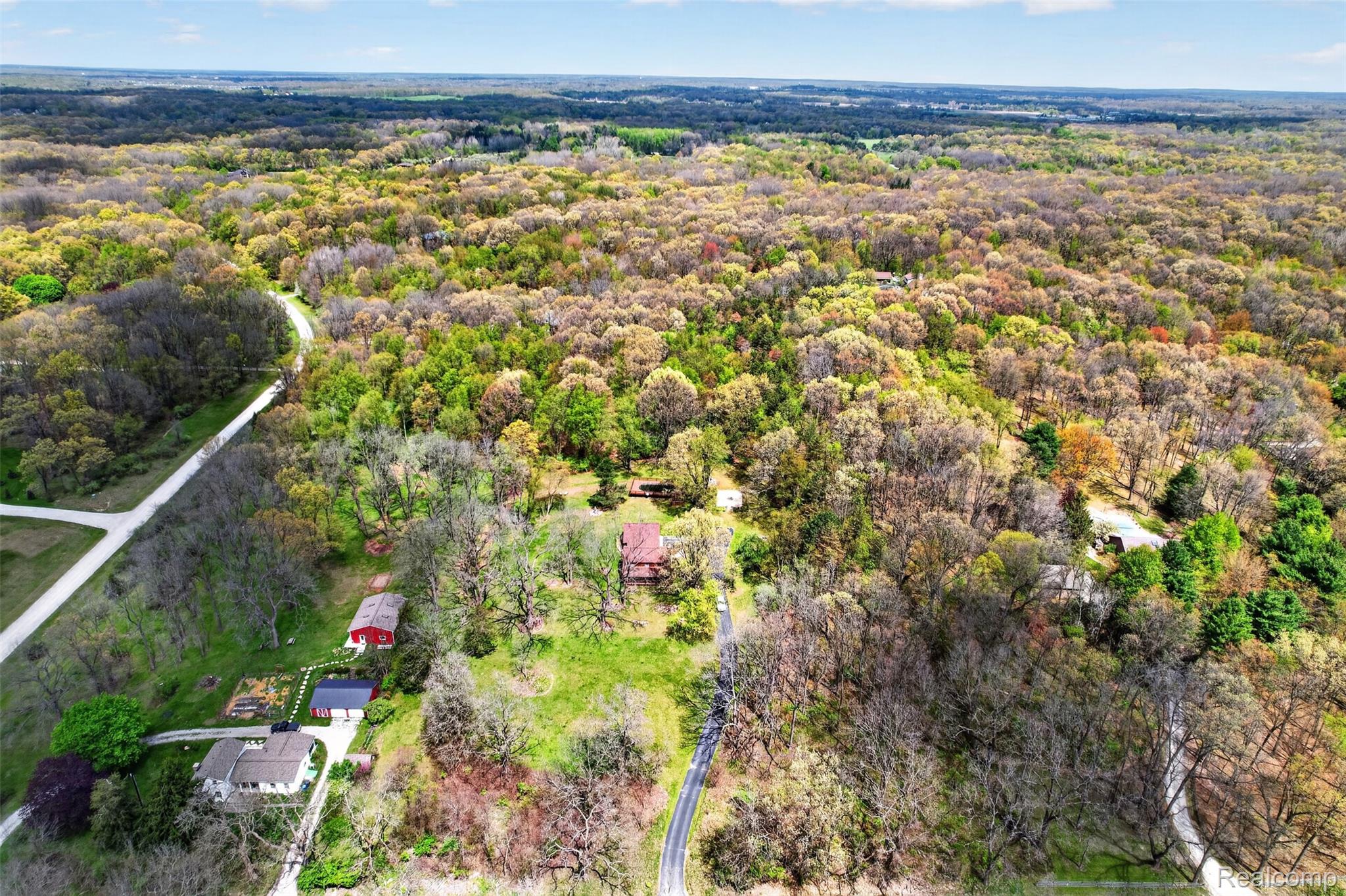 2997 Brighton Road Howell, MI 48843 - Photo 30 of 30 Aerial view of a forest