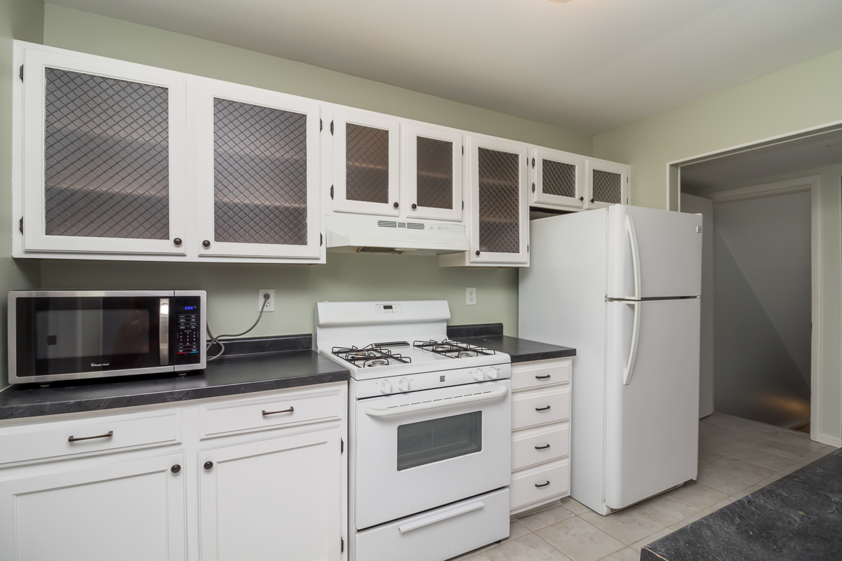 11 Cypress Square Place Elgin, IL 60123 - Photo 2 of 21 a kitchen with stainless steel appliances white cabinets and a stove top oven