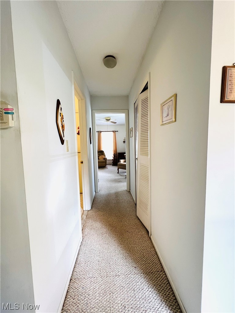 4940 Friar Road, Unit B Stow, OH 44224 - Photo 16 of 33 Corridor with light colored carpet