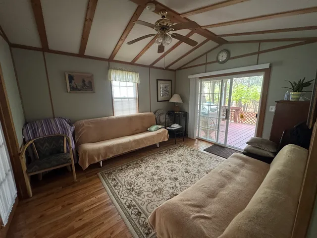 a living room with furniture and a couch