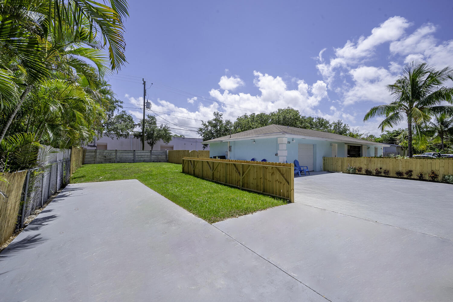 1718 Ridge Road North Palm Beach, FL 33408 - Photo 18 of 39 a front view of house with yard and green space