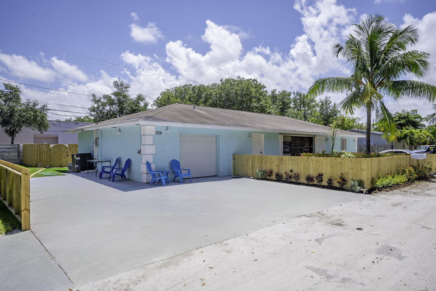 1718 Ridge Road North Palm Beach, FL 33408 - Photo 23 of 39 a view of a house with a patio