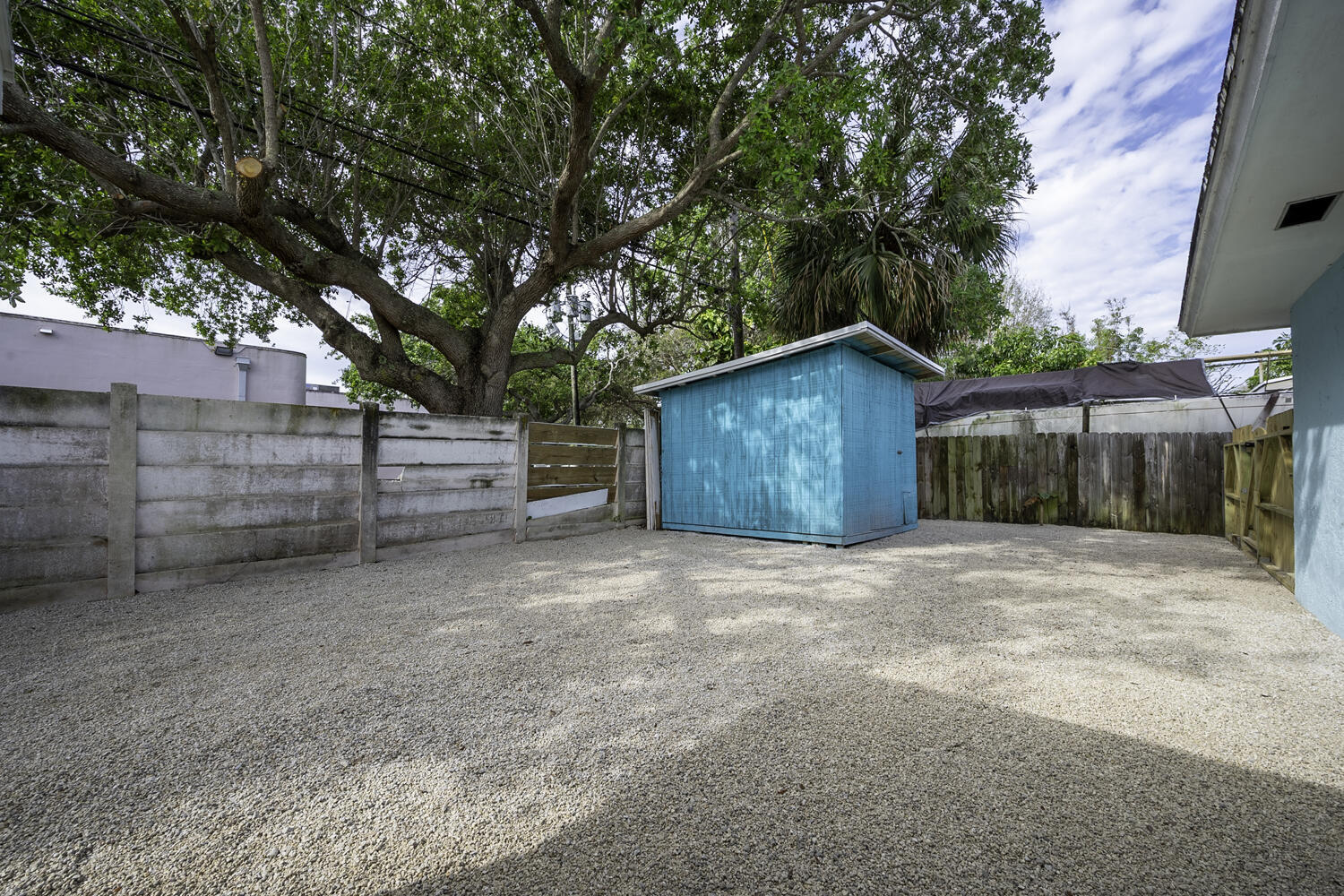 1718 Ridge Road North Palm Beach, FL 33408 - Photo 25 of 39 a house with a tree in front of it