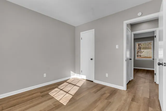 a view of an empty room and window