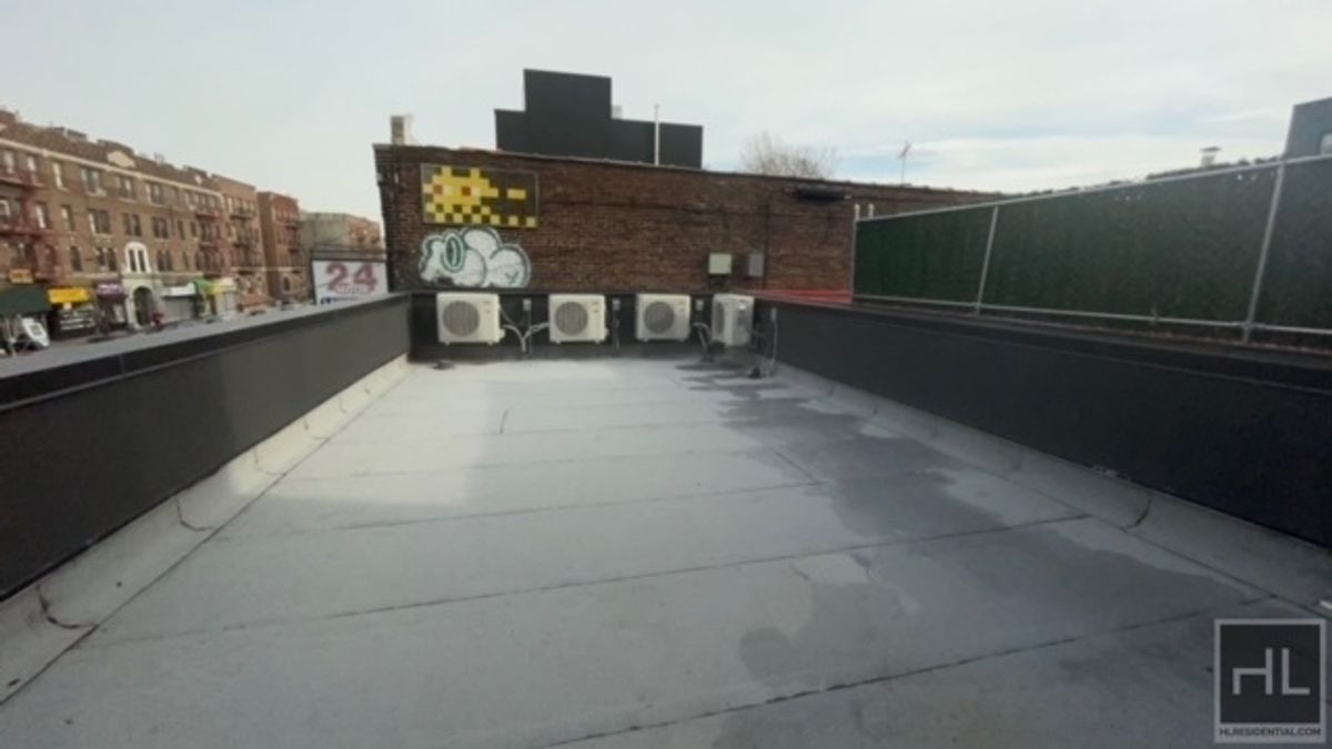 237 Utica Avenue, Unit 2R Brooklyn, NY 11213 - Photo 11 of 34 a balcony with a table and chairs