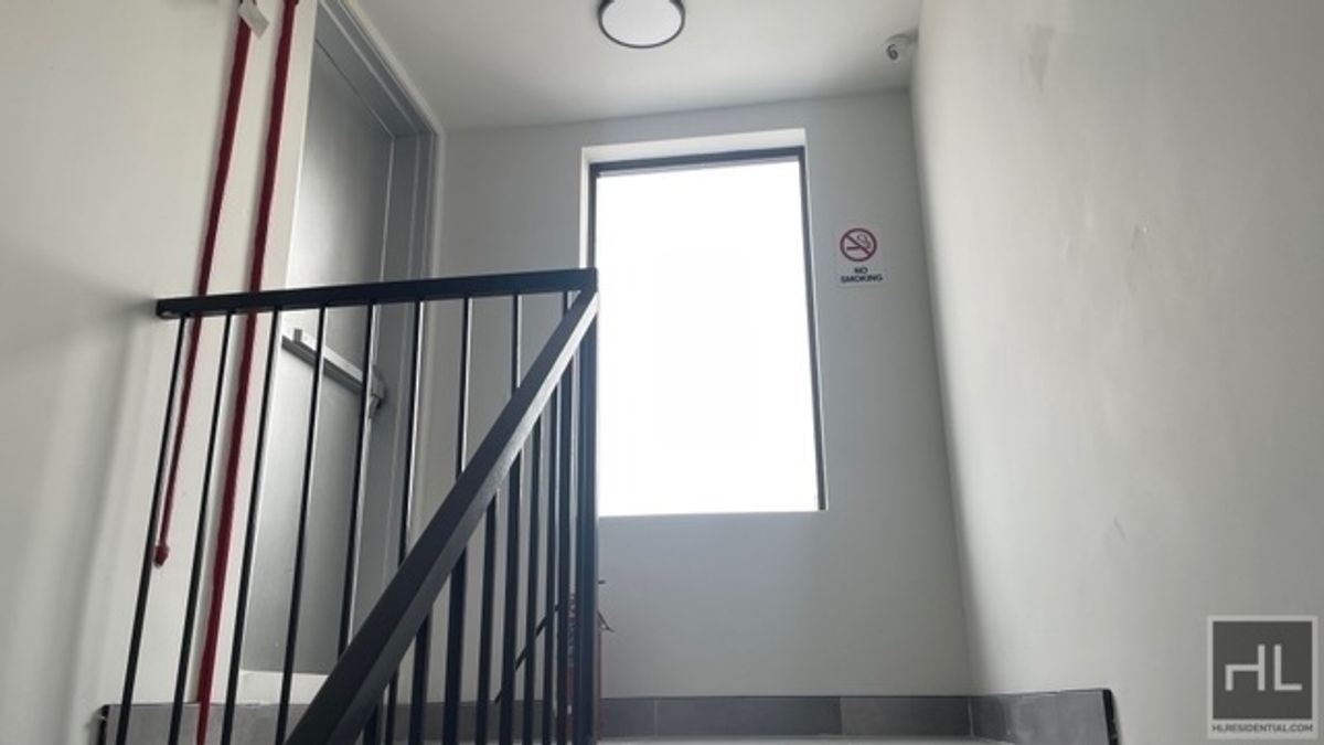 237 Utica Avenue, Unit 2R Brooklyn, NY 11213 - Photo 18 of 34 a view of a hallway with wooden floor and a window