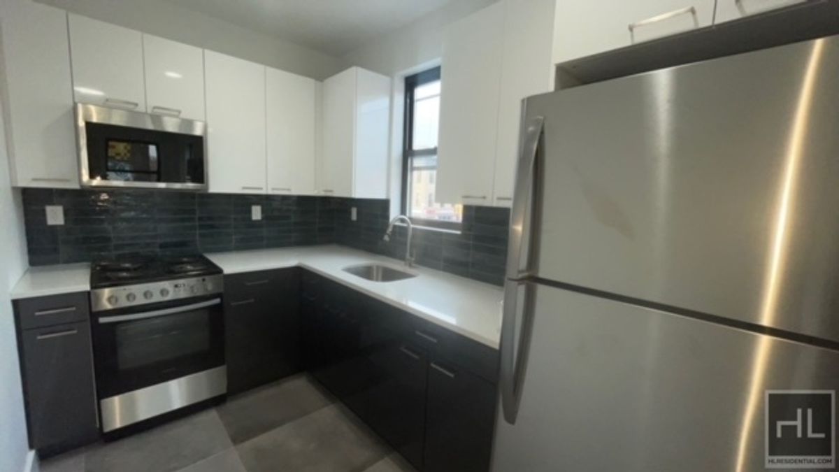 237 Utica Avenue, Unit 2R Brooklyn, NY 11213 - Photo 2 of 34 a kitchen with a refrigerator stove and microwave