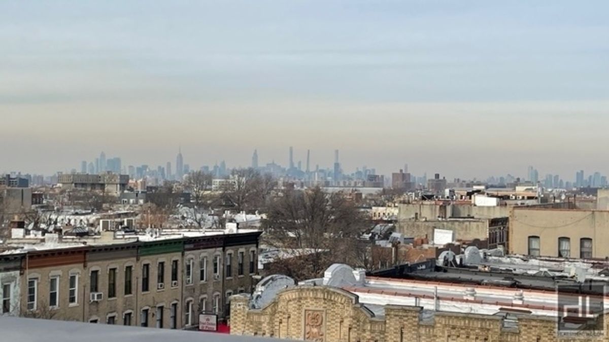 237 Utica Avenue, Unit 2R Brooklyn, NY 11213 - Photo 28 of 34 a view of a city with tall buildings