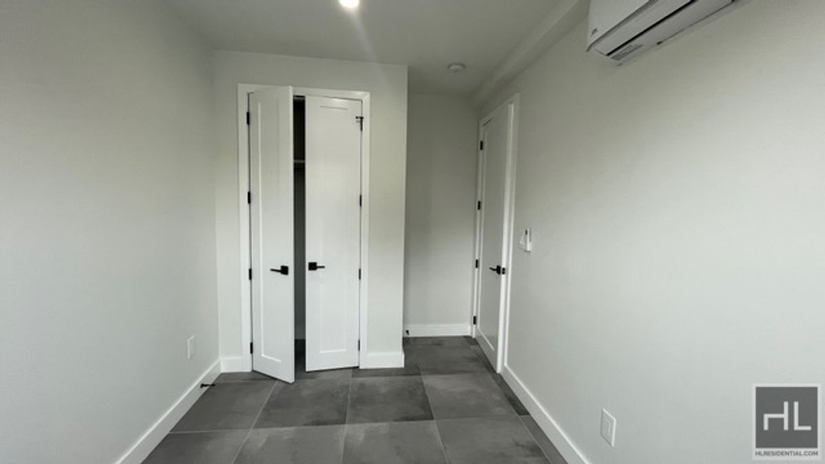 237 Utica Avenue, Unit 2R Brooklyn, NY 11213 - Photo 8 of 34 a view of a hallway with closet area