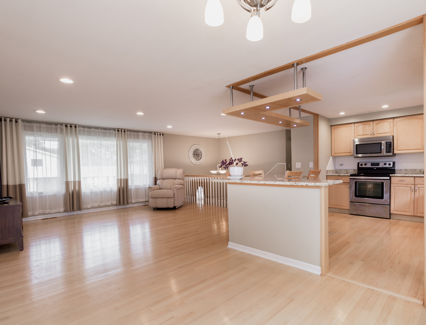 829 Pinehurst Lane Schaumburg, IL 60193 - Photo 15 of 45 a view of living room with furniture and a ceiling fan