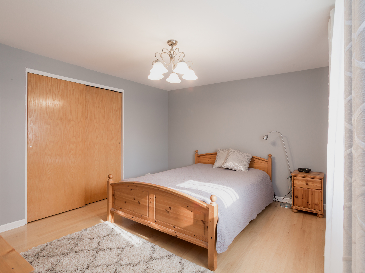 829 Pinehurst Lane Schaumburg, IL 60193 - Photo 17 of 45 a bedroom with a bed and a window