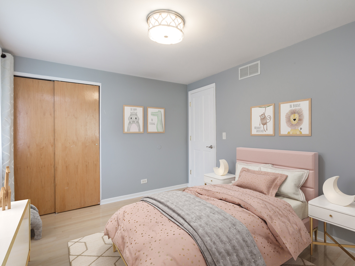 829 Pinehurst Lane Schaumburg, IL 60193 - Photo 25 of 45 a bedroom with a large bed and a chandelier