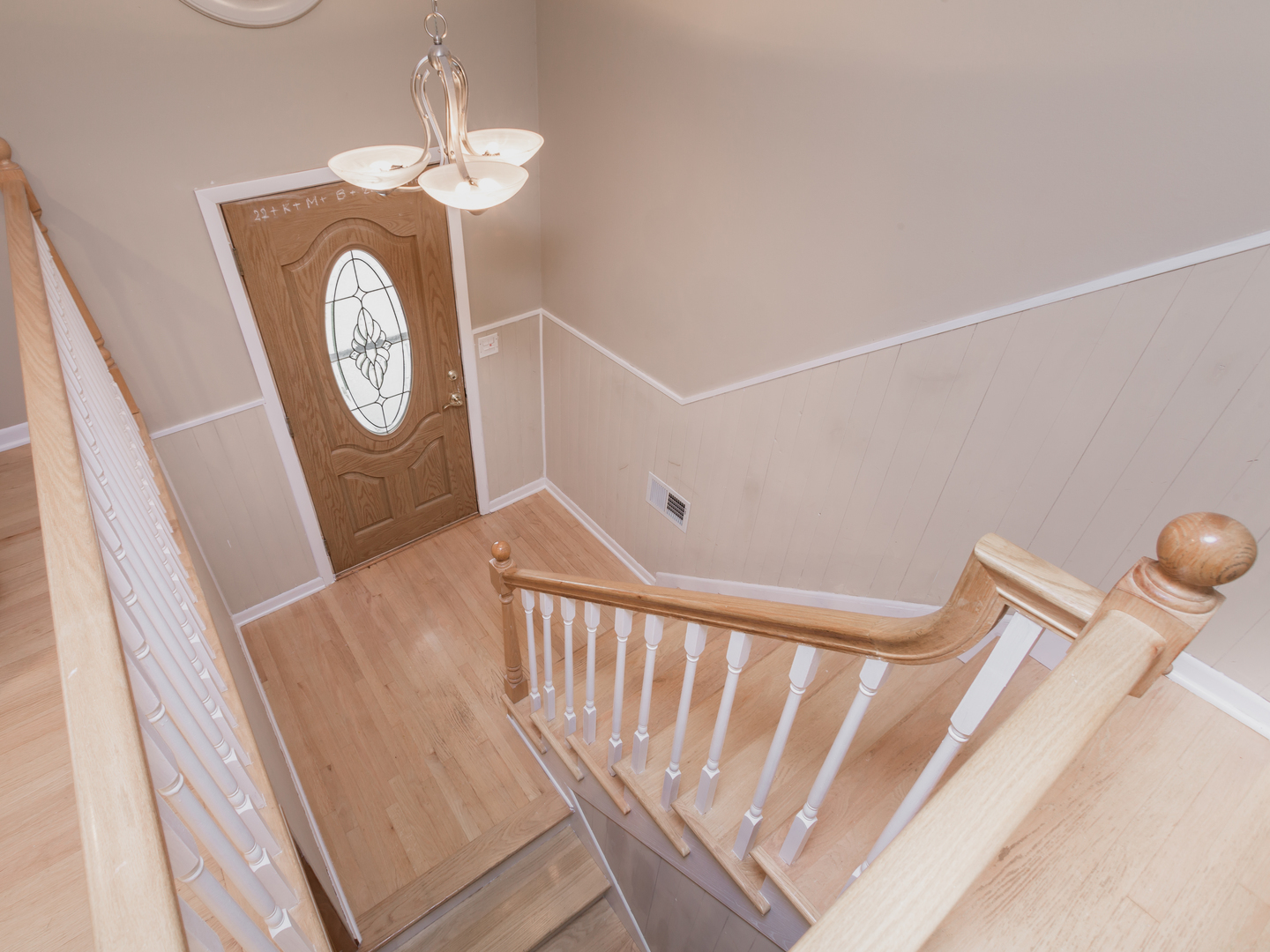 829 Pinehurst Lane Schaumburg, IL 60193 - Photo 30 of 45 a view of entryway with stairs and wooden floor