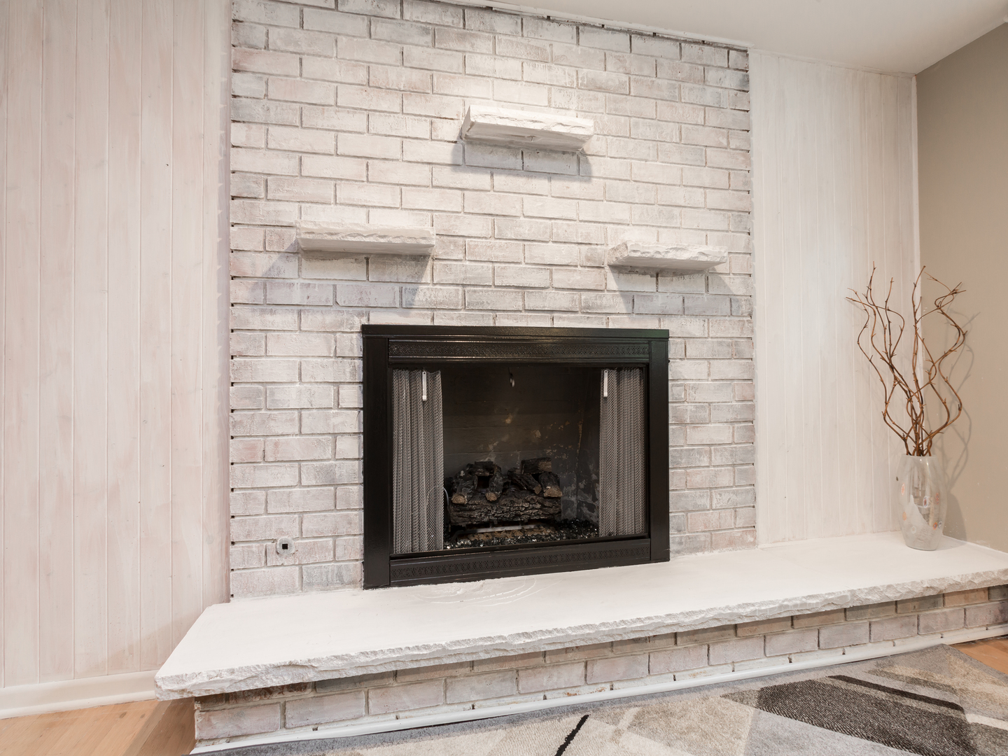 829 Pinehurst Lane Schaumburg, IL 60193 - Photo 34 of 45 a fireplace with a vase