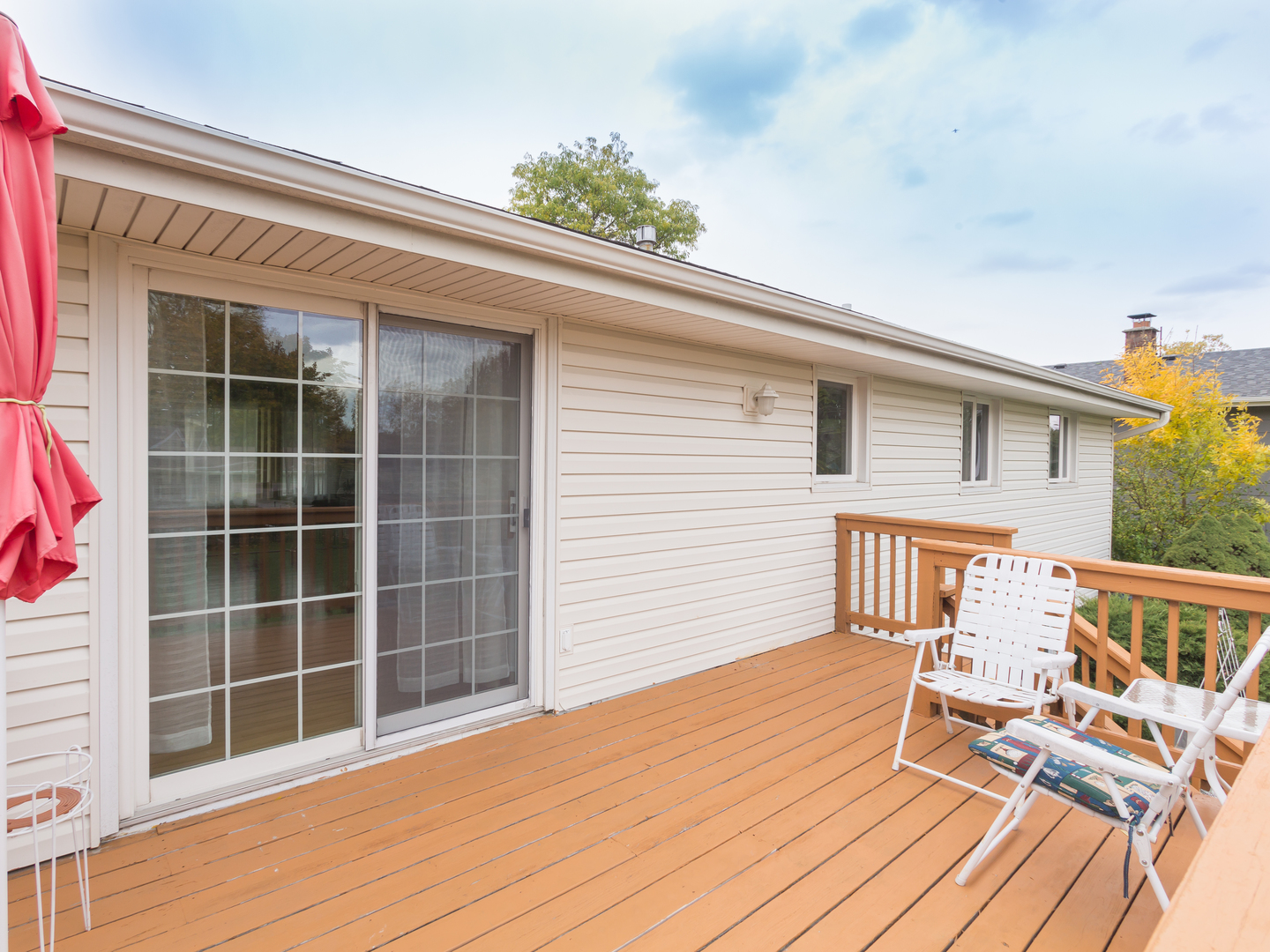 829 Pinehurst Lane Schaumburg, IL 60193 - Photo 43 of 45 a view of a house with a large window and wooden floor