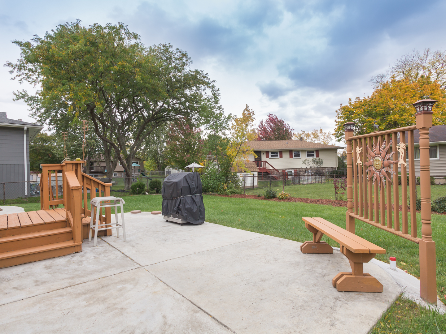 829 Pinehurst Lane Schaumburg, IL 60193 - Photo 44 of 45 a view of a chair and table in the back yard of the house
