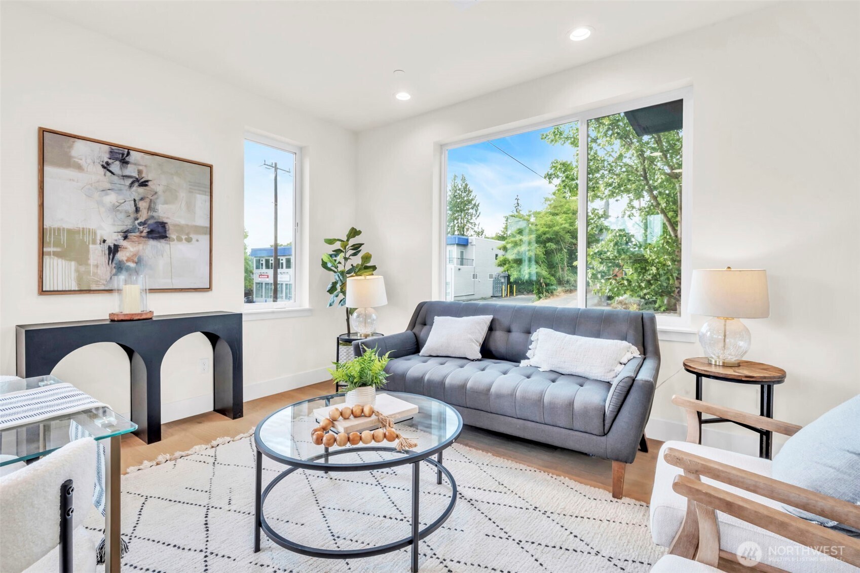 6408 Fauntleroy Way Southwest Seattle, WA 98136 - Photo 15 of 40 a living room with furniture and a large window