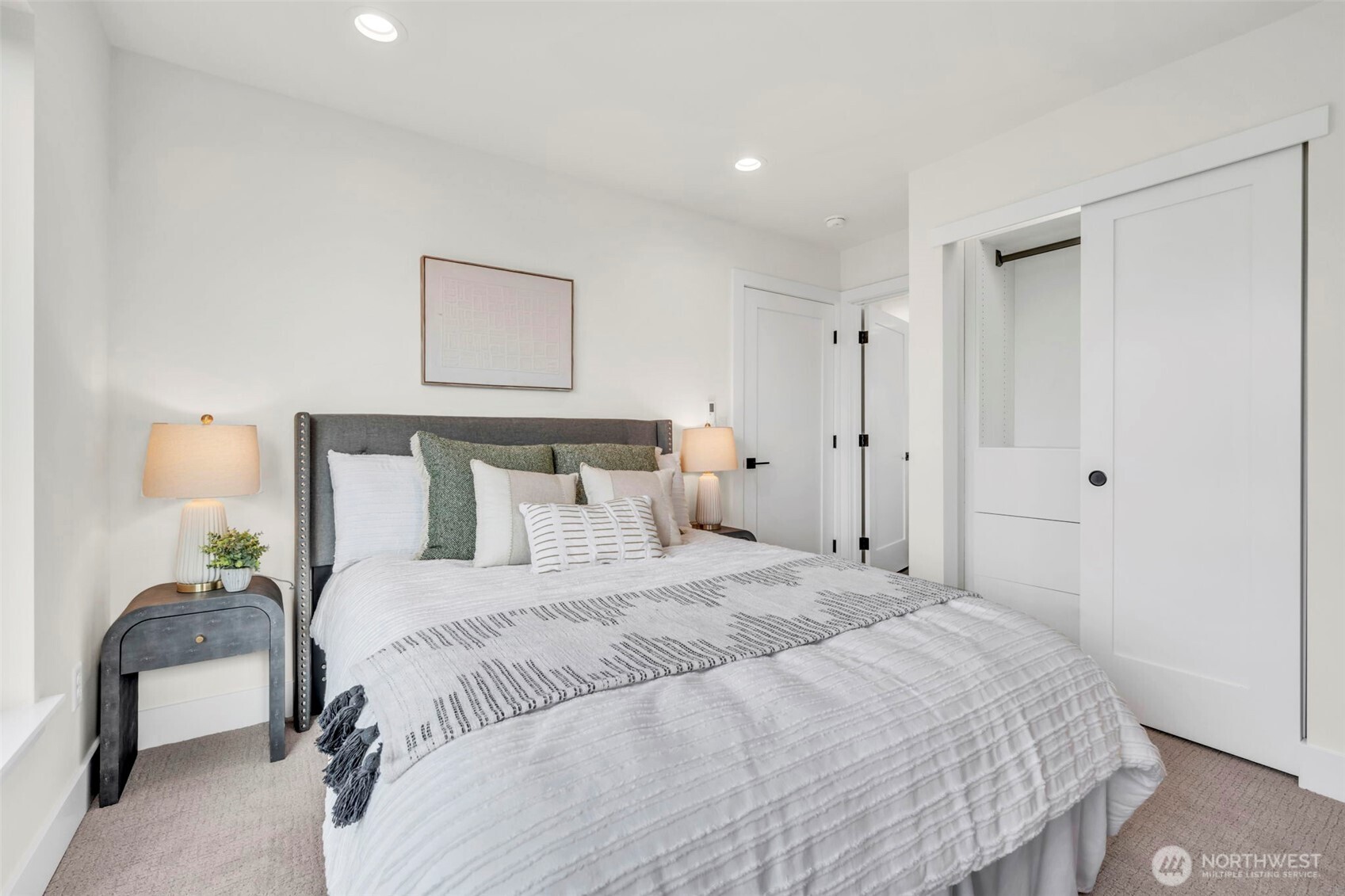 6408 Fauntleroy Way Southwest Seattle, WA 98136 - Photo 17 of 40 a bedroom with a bed and a lamp