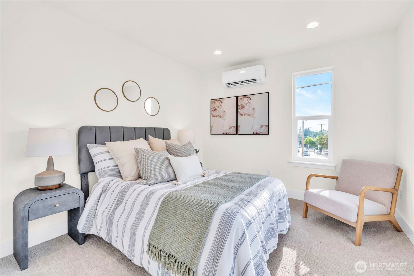 6408 Fauntleroy Way Southwest Seattle, WA 98136 - Photo 22 of 40 a bedroom with a bed and a chair