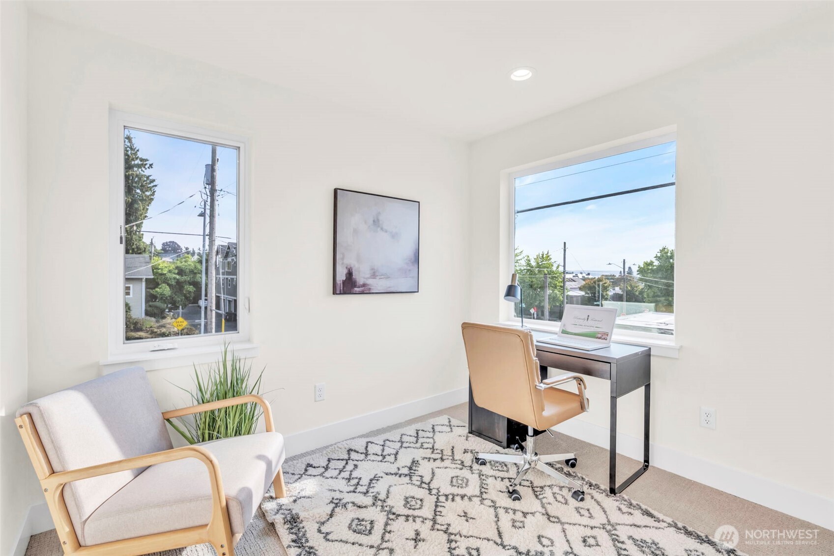6408 Fauntleroy Way Southwest Seattle, WA 98136 - Photo 23 of 40 a living room with a couch and a window
