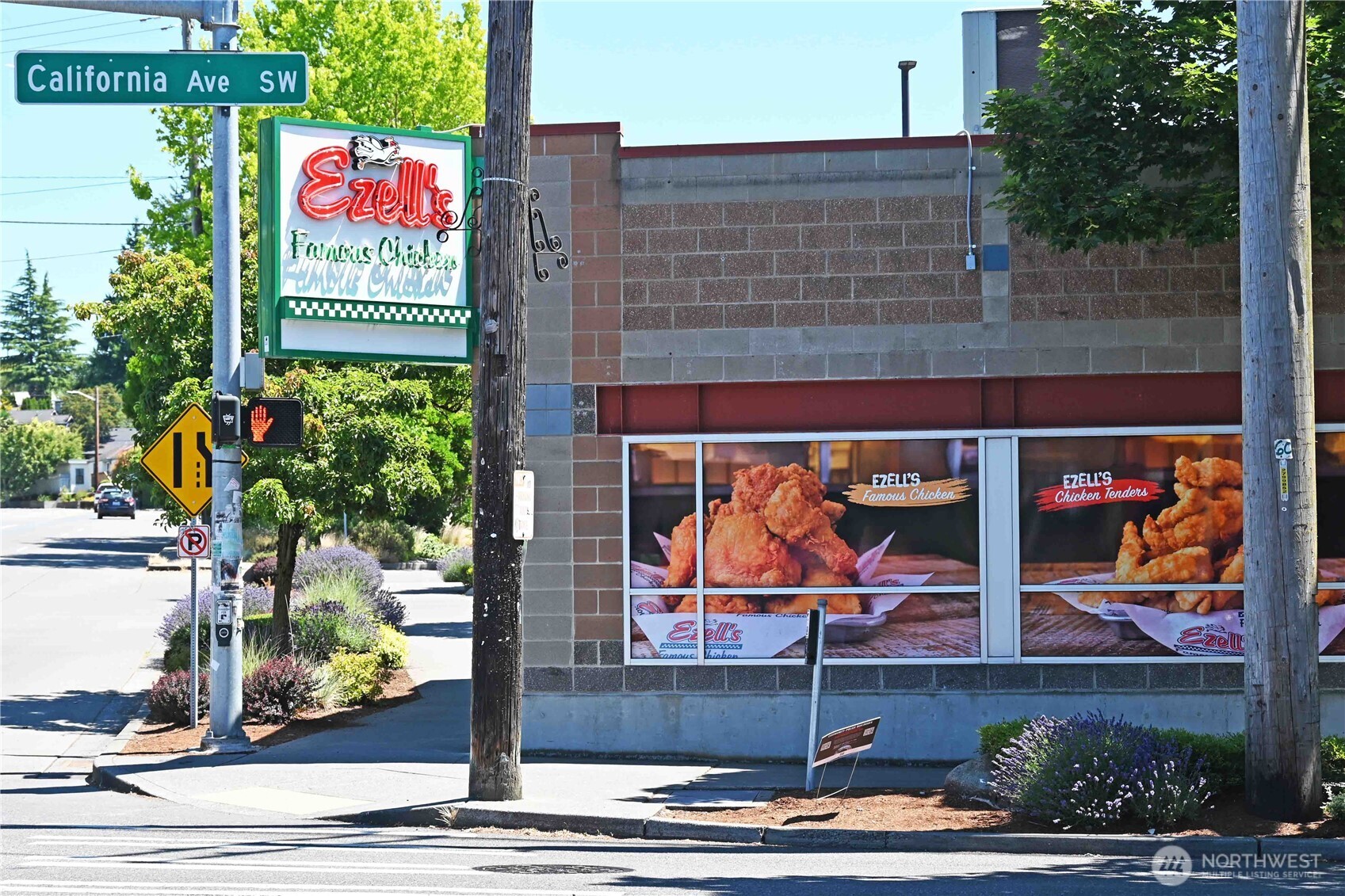 6408 Fauntleroy Way Southwest Seattle, WA 98136 - Photo 31 of 40 a sign that is on the side of a building