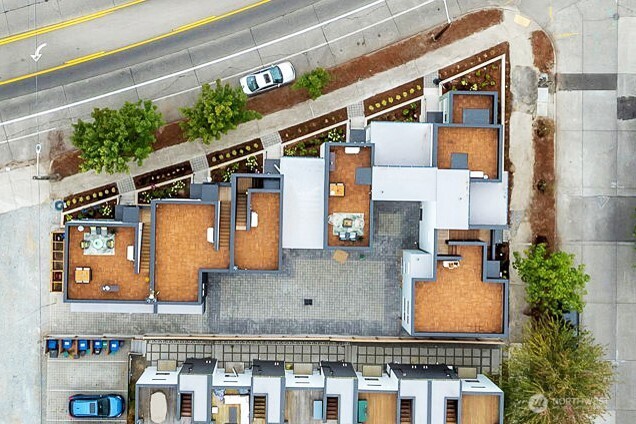 6408 Fauntleroy Way Southwest Seattle, WA 98136 - Photo 4 of 40 an aerial view of residential houses with outdoor space and street view