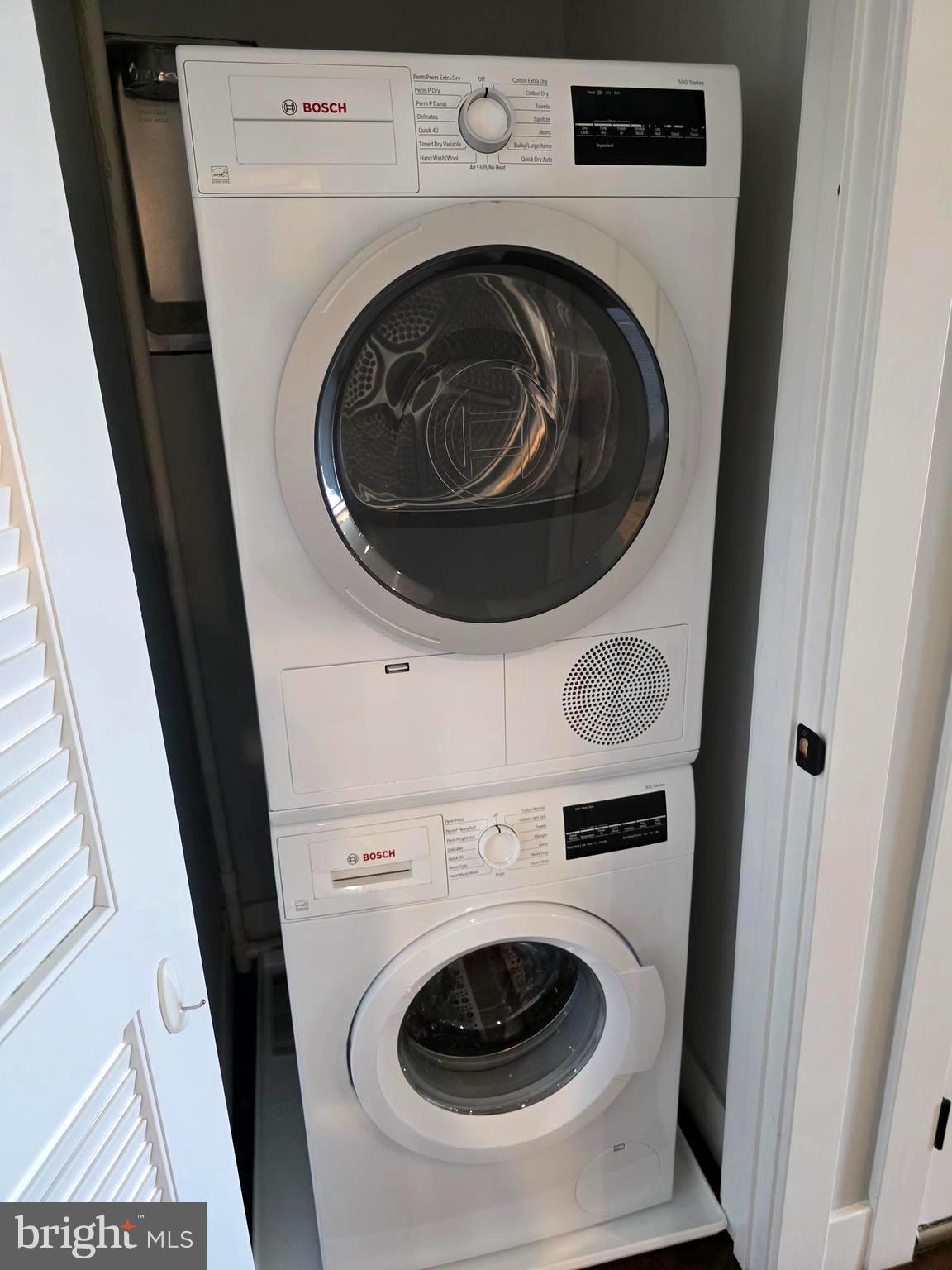 1101 Fern Street Northwest, Unit 301 Washington, DC 20012 - Photo 23 of 25 a utility room with dryer and washer