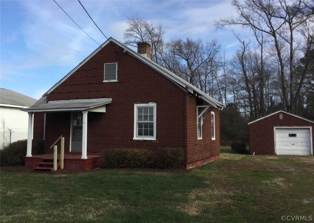 11 Rodman Road Richmond, VA 23224 - Photo 1 of 15 a front view of a house with a yard