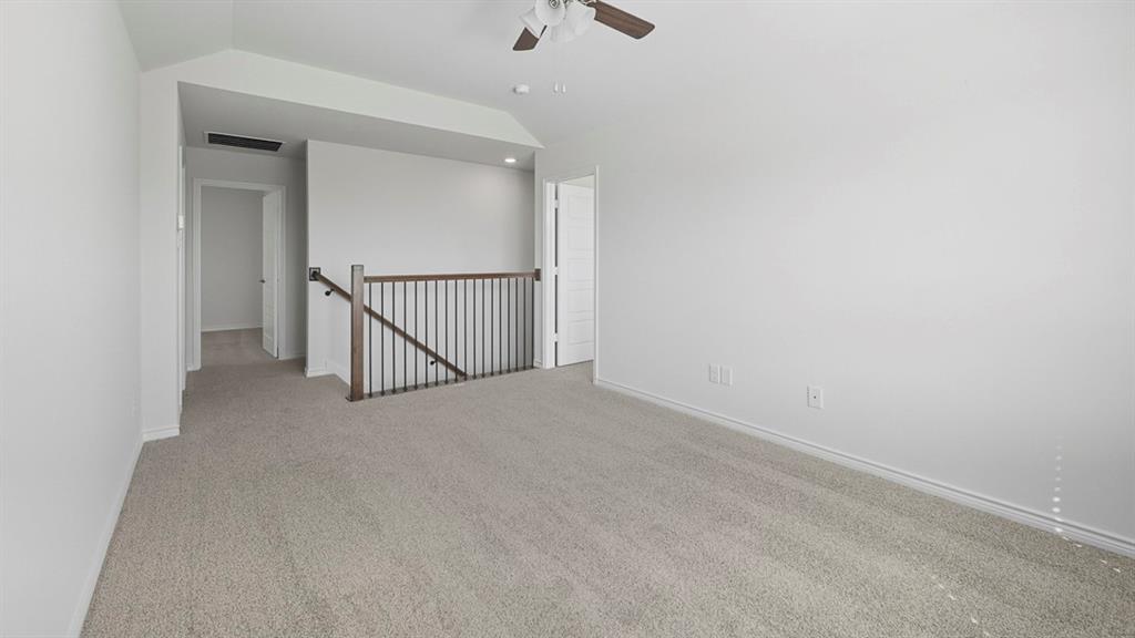 3405 Bar Claims Street Aubrey, TX 76227 - Photo 21 of 38 an empty room with a ceiling fan and a window