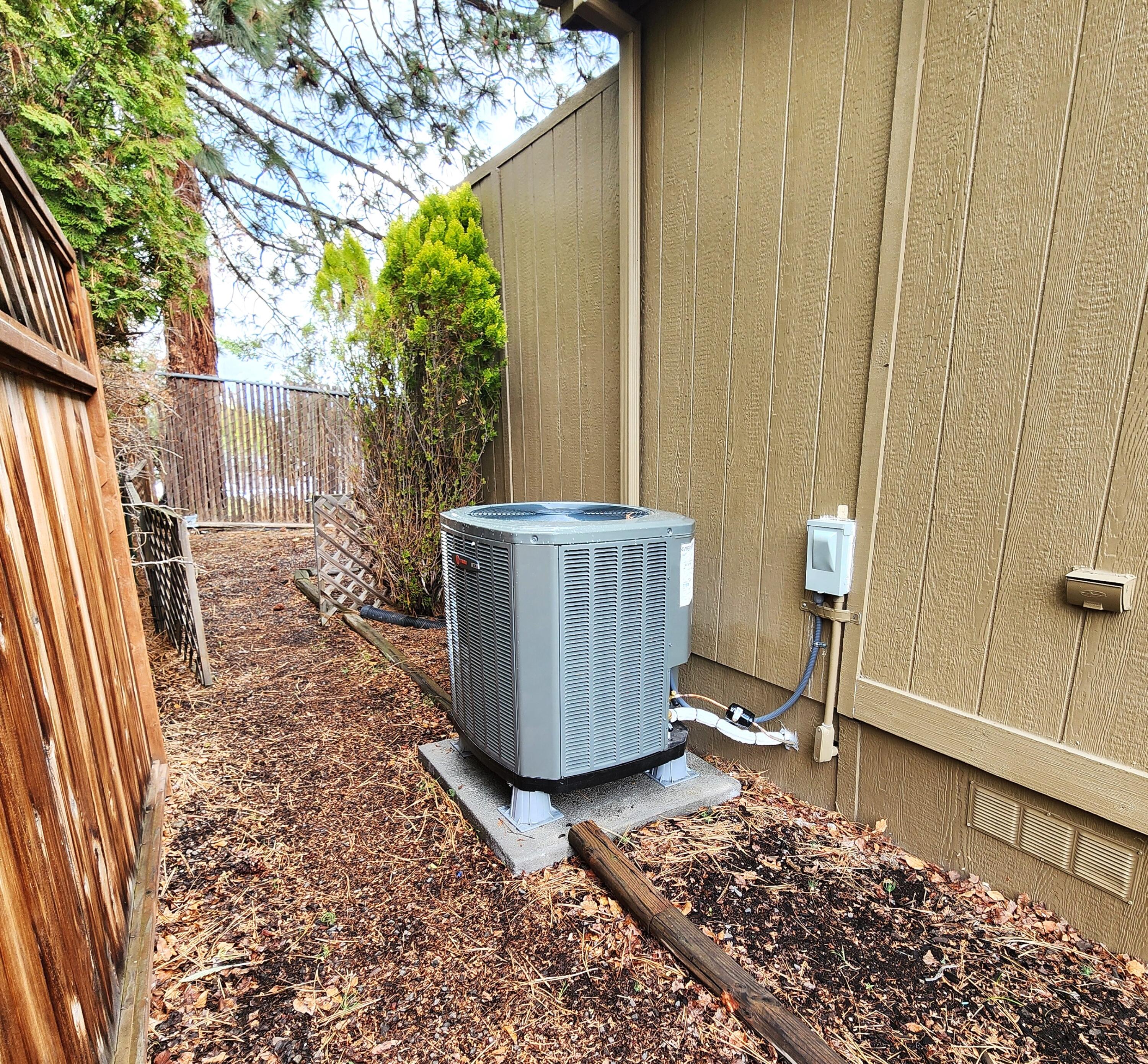 1001 Southeast 15th Street, Unit 34 Bend, OR 97702 - Photo 35 of 43 New (2025) heat pump in side yard