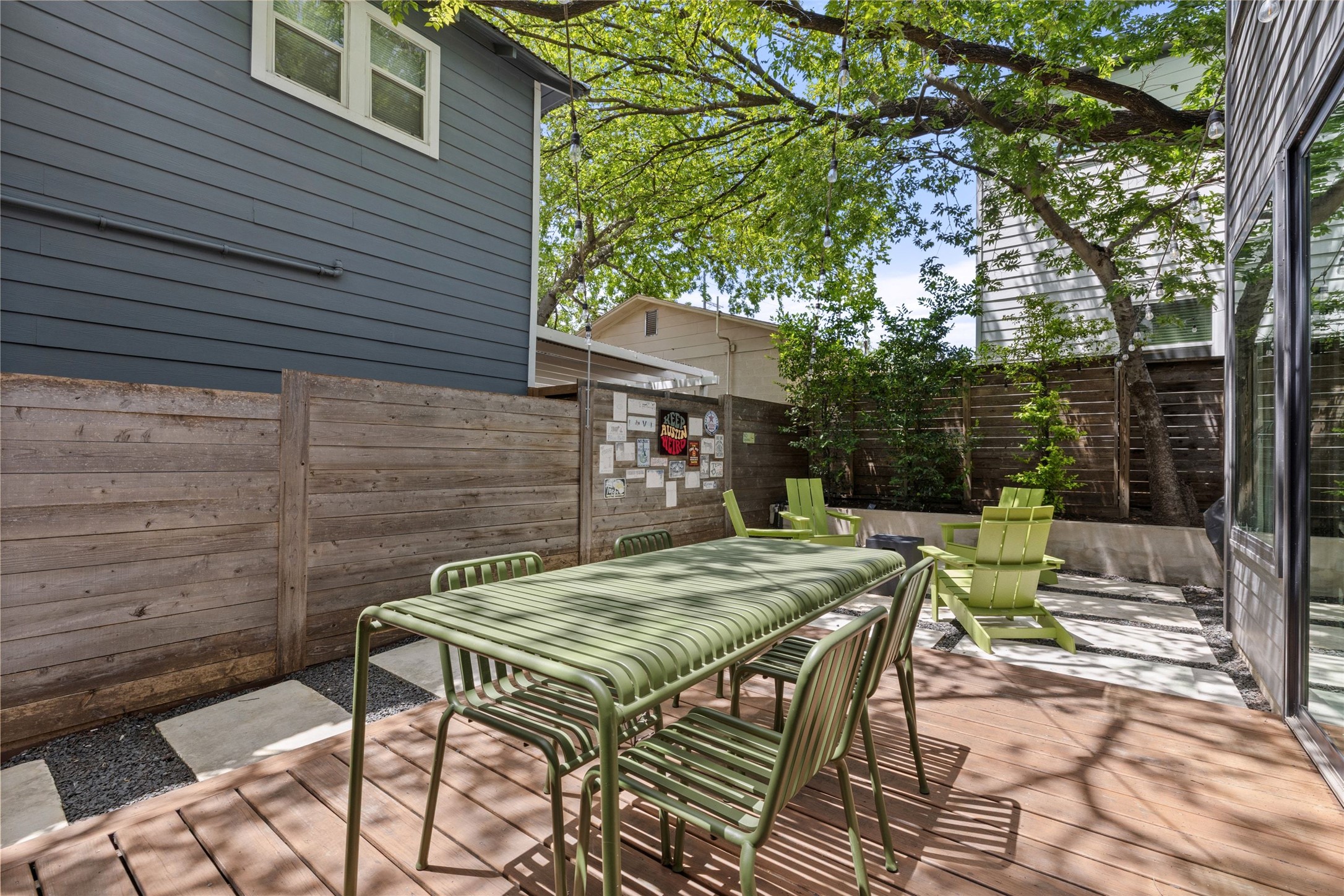 2202 Santa Rita Street Austin, TX 78702 - Photo 32 of 40 Private backyard with seating area, fire pit, and backyard deck