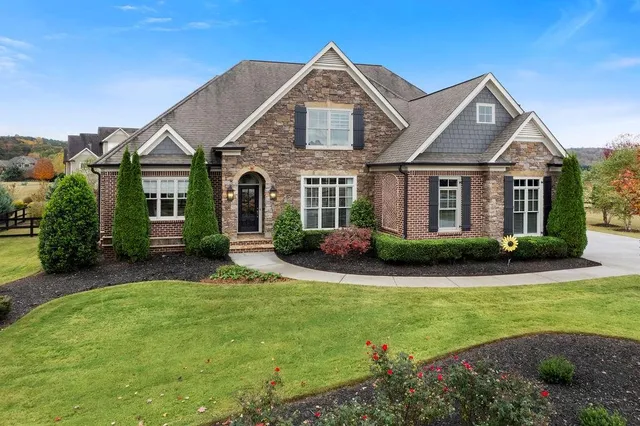 front view of a house with a yard