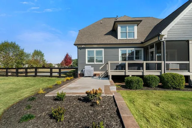 a view of a water fountain with a yard