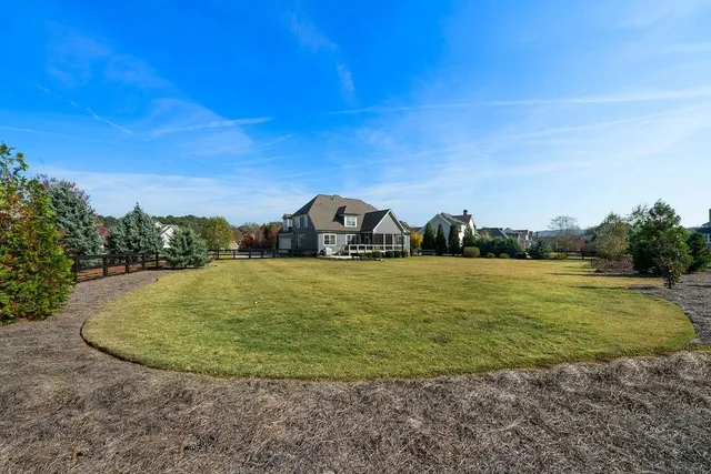 a aerial view of a house with swimming pool