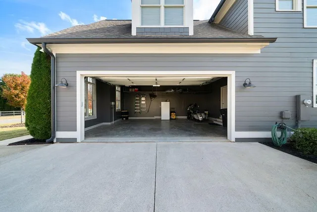 a view of a livingroom with wooden floor and a window